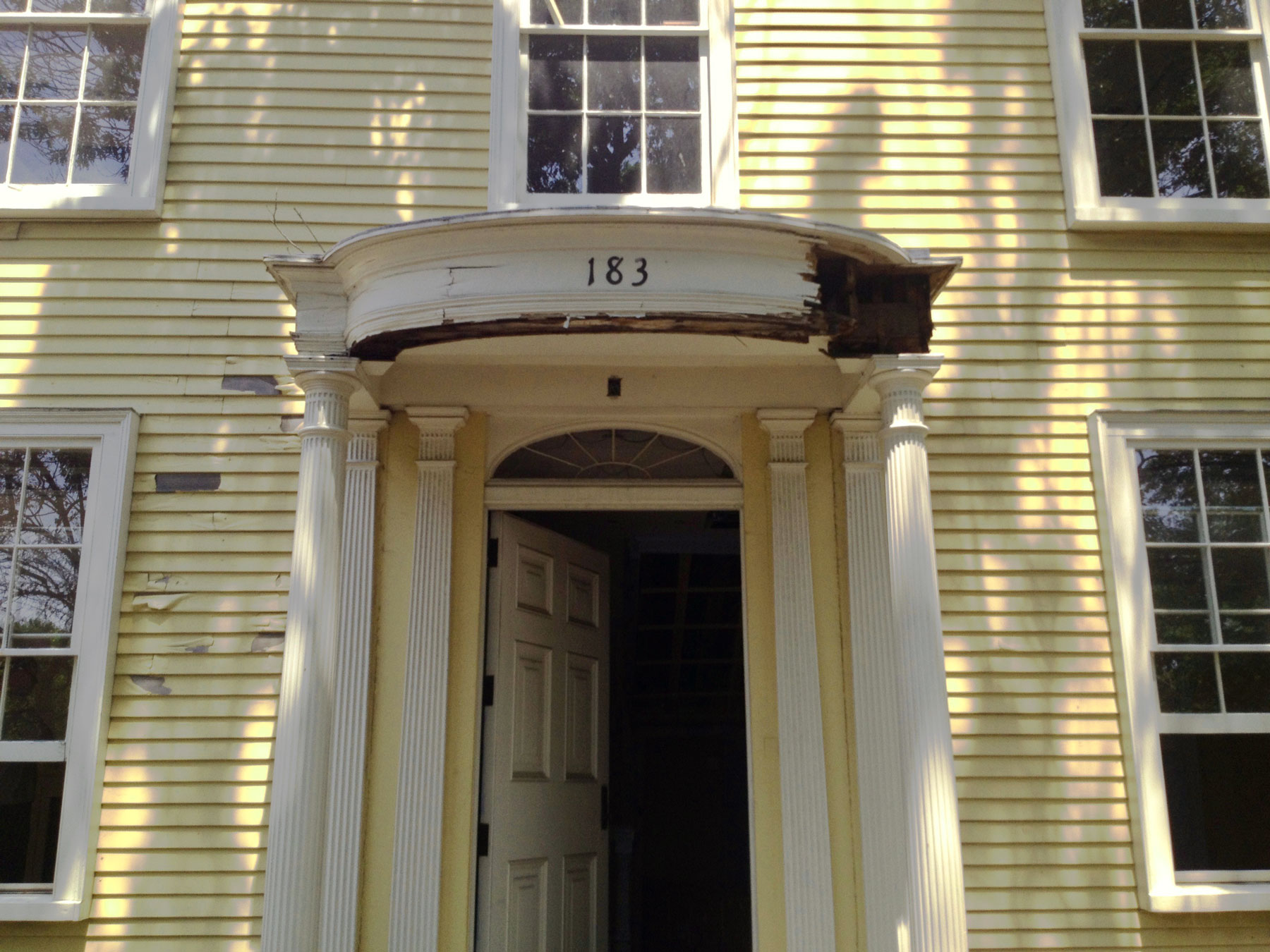 Dillaway Thomas House Doorway renovation 183 Roxbury Street, Roxbury Crossing, MA . Bonding with clients over historical finishes