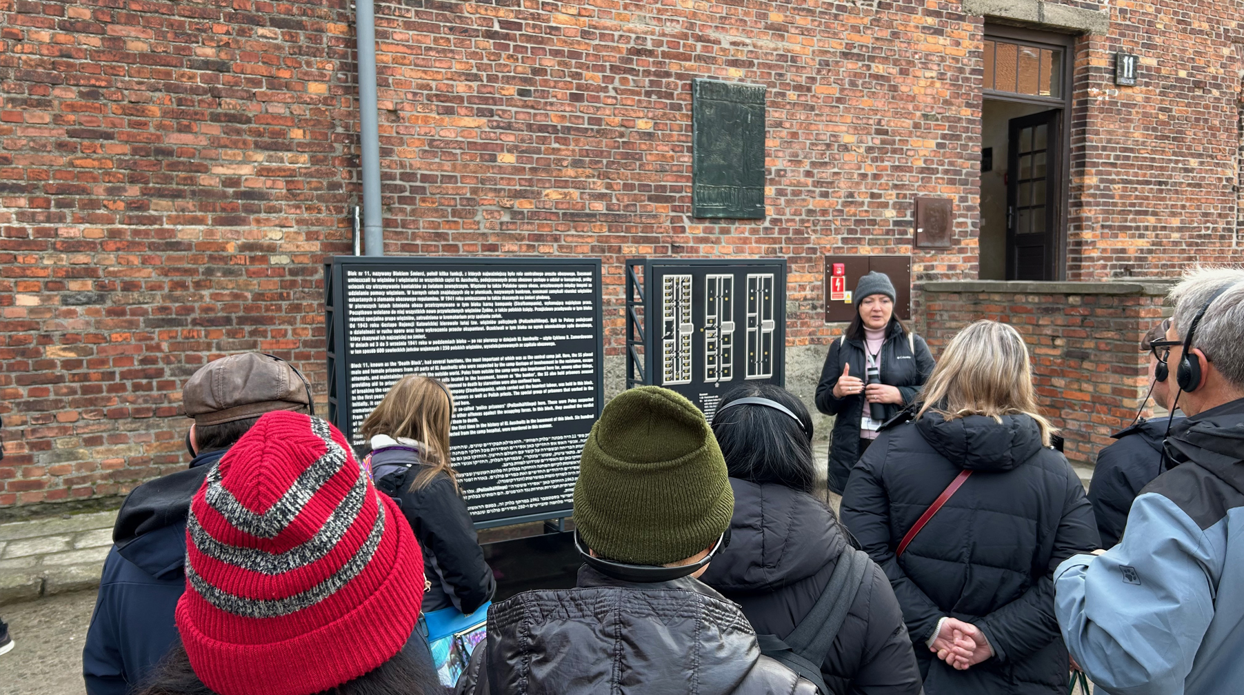 Our very qualified guide and interpreter in front of the "Death block" Block 11, in Auschwitz 1, the main camp made up of former Polish Army barracks.